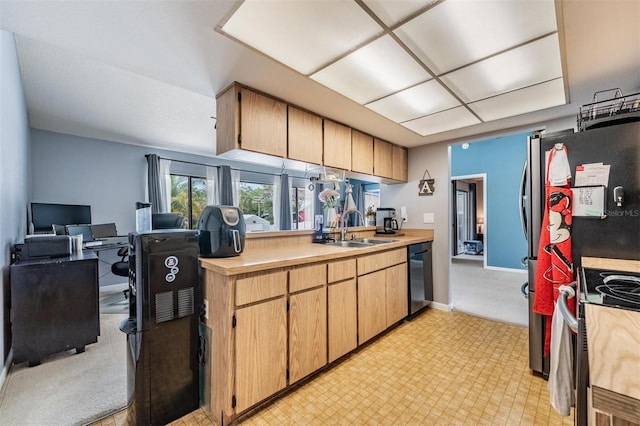 5540 Applegate Dr, Spring Hill, FL 34606 - kitchen with a sink, stainless steel range oven, light countertops, and black dishwasher