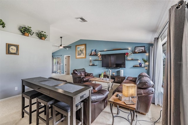 5540 Applegate Dr, Spring Hill, FL 34606 - living room with vaulted ceiling, light colored carpet, ceiling fan, a textured ceiling, and baseboards