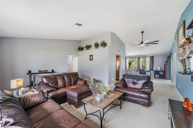 5540 Applegate Dr, Spring Hill, FL 34606 - living room with ceiling fan, light carpet, vaulted ceiling, and baseboards