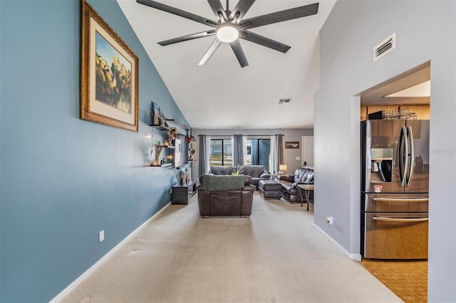 5540 Applegate Dr, Spring Hill, FL 34606 - carpeted living area with baseboards, ceiling fan, and high vaulted ceiling