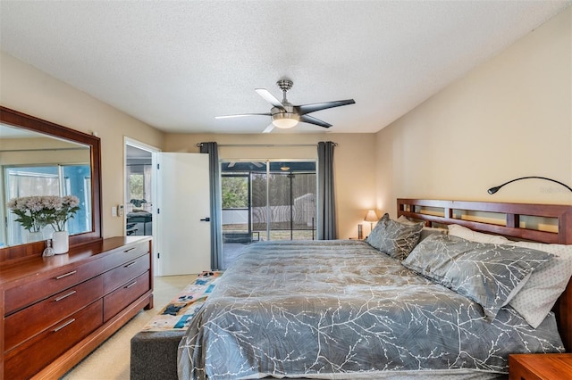 5540 Applegate Dr, Spring Hill, FL 34606 - bedroom featuring access to exterior, a textured ceiling, light colored carpet, and ceiling fan