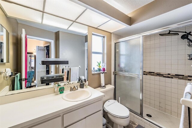 5540 Applegate Dr, Spring Hill, FL 34606 - full bathroom with toilet, a stall shower, and vanity