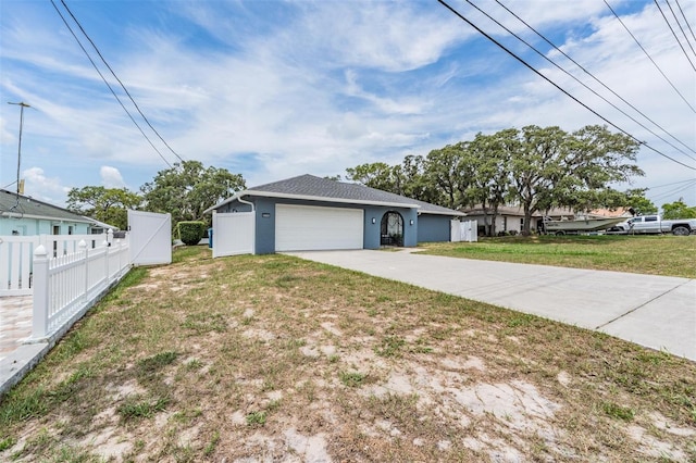 5540 Applegate Dr, Spring Hill, FL 34606 - view of front of home featuring driveway and a garage
