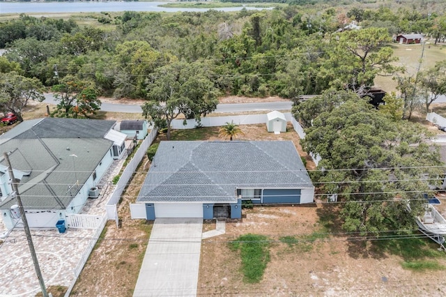 5540 Applegate Dr, Spring Hill, FL 34606 - view from above of property with a forest