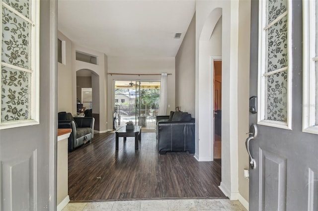 6918 Potomac Cir, Riverview, FL 33578 - foyer entrance with arched walkways and baseboards
