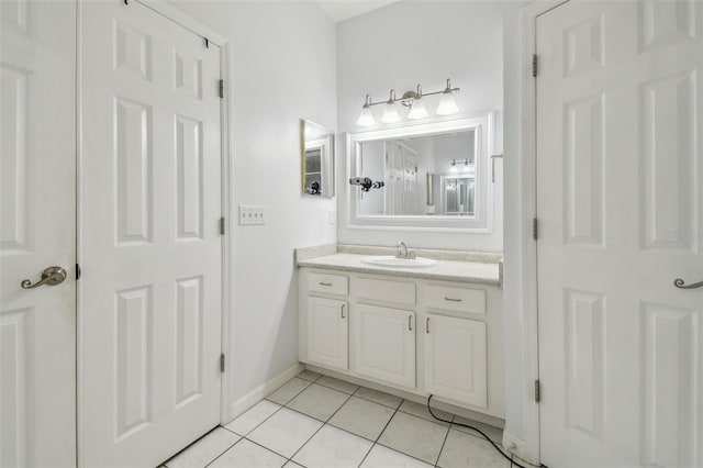 6918 Potomac Cir, Riverview, FL 33578 - bathroom featuring vanity, tile patterned flooring, and baseboards