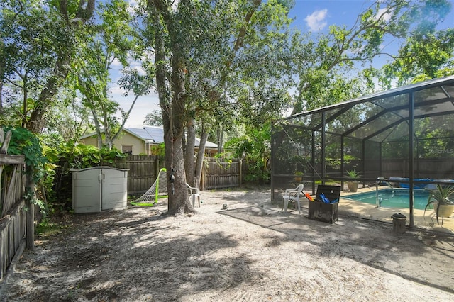 6918 Potomac Cir, Riverview, FL 33578 - fenced backyard with glass enclosure