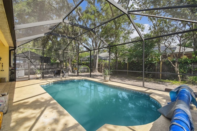 6918 Potomac Cir, Riverview, FL 33578 - view of swimming pool with a fenced backyard, a patio, and glass enclosure