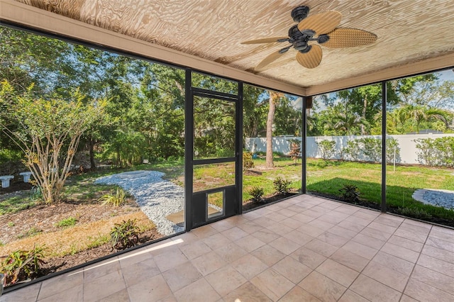 3041 Oak View Dr, Palm Harbor, FL 34684 - unfurnished sunroom with a ceiling fan
