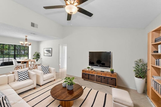 3041 Oak View Dr, Palm Harbor, FL 34684 - living area with light tile patterned flooring, a ceiling fan, and a chandelier