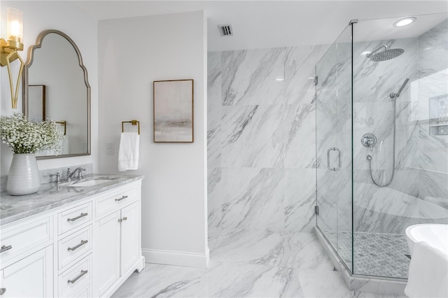 8518 Tidal Bay Ln, Tampa, FL 33635 - full bathroom with a marble finish shower, vanity, a freestanding bath, baseboards, and marble look tile flooring