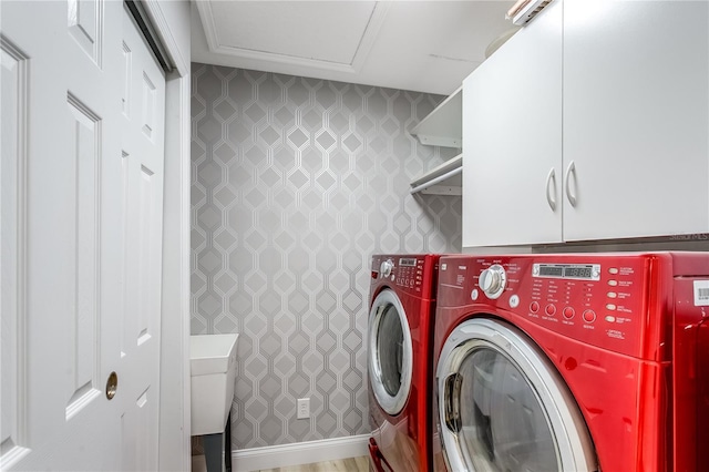 8518 Tidal Bay Ln, Tampa, FL 33635 - laundry area with cabinet space and washer and dryer