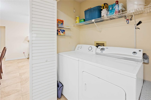 8436 60th St N Unit 304, Pinellas Park, FL 33781 - laundry area featuring independent washer and dryer and baseboards