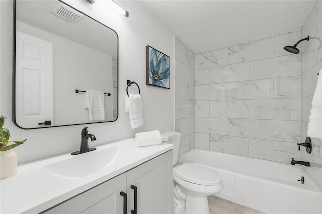 6804 Tierra Verde St, Port Richey, FL 34668 - full bathroom with a textured ceiling, vanity, tub / shower combination, toilet, and wood finished floors