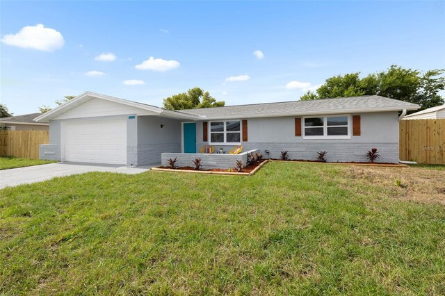 6804 Tierra Verde St, Port Richey, FL 34668 - single story home with a garage, concrete driveway, and stucco siding
