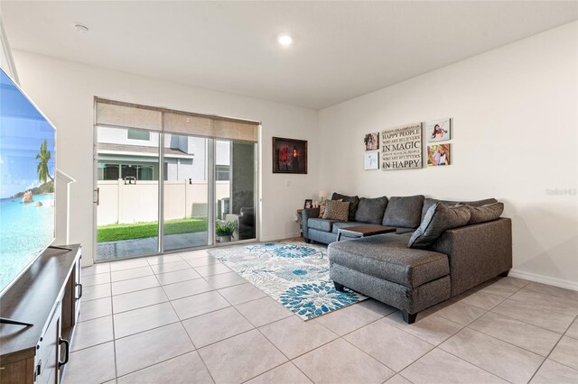 2925 Evergreen Elm Pass, Wesley Chapel, FL 33543 - living area with light tile patterned floors, baseboards, and recessed lighting