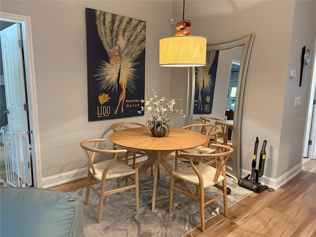 20938 Sunsweet Ct, Land O Lakes, FL 34637 - dining room with wood finished floors