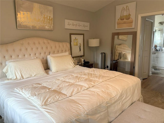 20938 Sunsweet Ct, Land O Lakes, FL 34637 - bedroom with wood finished floors