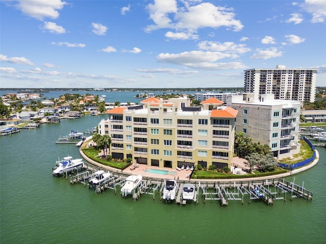 200 Skiff Pt Unit 202, Clearwater Beach, FL 33767 - aerial view of a large body of water and apartment complex