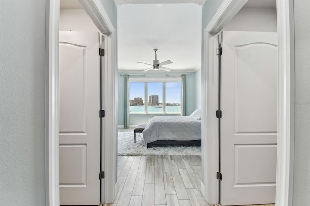 200 Skiff Pt Unit 202, Clearwater Beach, FL 33767 - hall with light wood finished floors