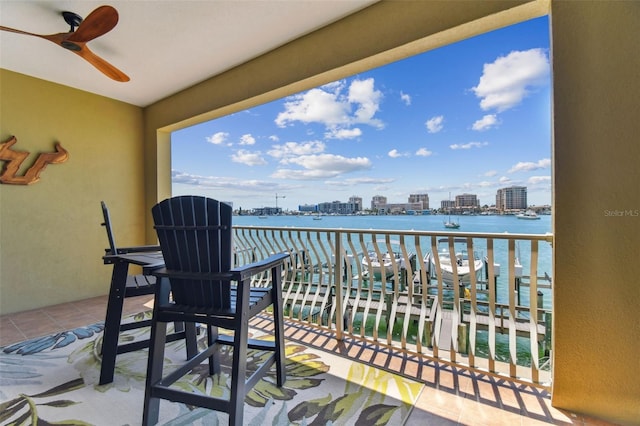 200 Skiff Pt Unit 202, Clearwater Beach, FL 33767 - balcony with ceiling fan, a view of city, and a water view
