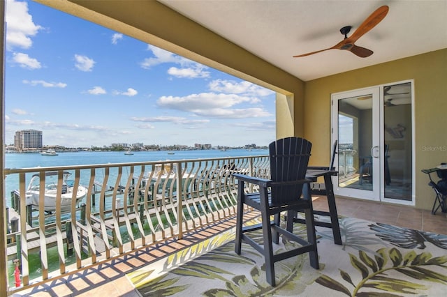 200 Skiff Pt Unit 202, Clearwater Beach, FL 33767 - balcony featuring ceiling fan and a water view