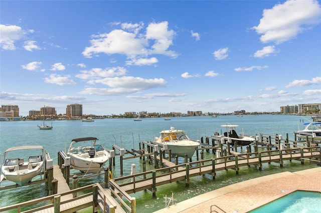 200 Skiff Pt Unit 202, Clearwater Beach, FL 33767 - dock with boat lift and a water view