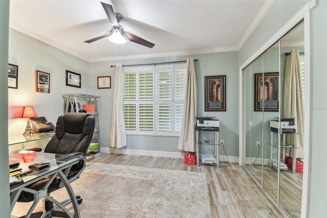 200 Skiff Pt Unit 202, Clearwater Beach, FL 33767 - office area featuring a ceiling fan, wood finished floors, crown molding, and baseboards