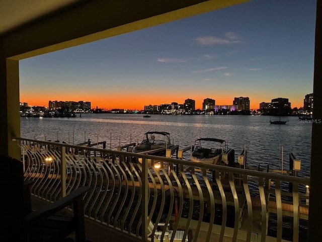 200 Skiff Pt Unit 202, Clearwater Beach, FL 33767 - water view featuring a dock, boat lift, and skyline