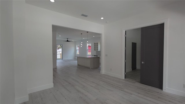7011 N 15th St, Tampa, FL 33610 - spare room with recessed lighting, light wood-style floors, and baseboards