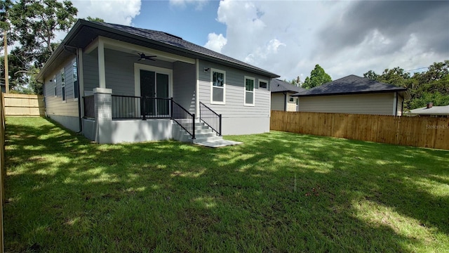 7011 N 15th St, Tampa, FL 33610 - back of house featuring ceiling fan