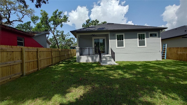 7011 N 15th St, Tampa, FL 33610 - back of property with a ceiling fan