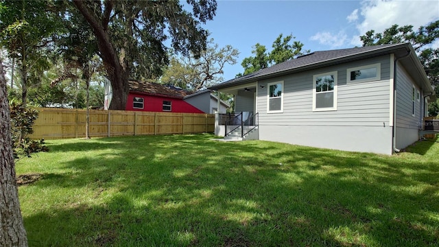 7011 N 15th St, Tampa, FL 33610 - back of property with a ceiling fan