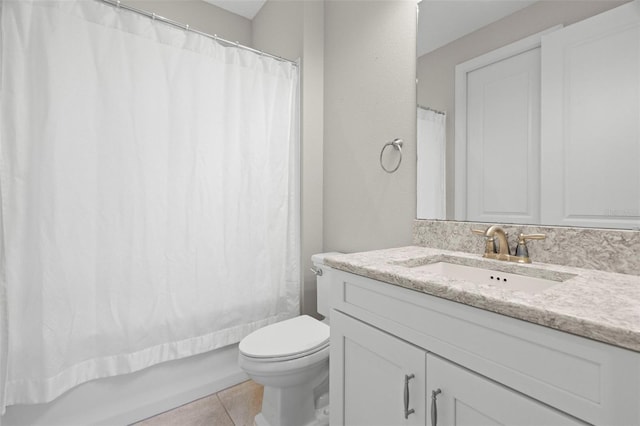 11354 Callisia Dr, Odessa, FL 33556 - full bathroom featuring vanity, toilet, tile patterned floors, and shower / tub combo