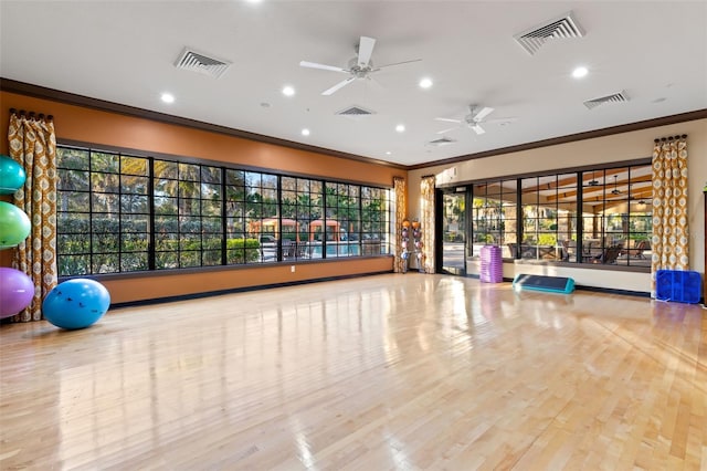 11354 Callisia Dr, Odessa, FL 33556 - exercise area featuring ornamental molding, recessed lighting, healthy amount of natural light, a ceiling fan, and wood finished floors