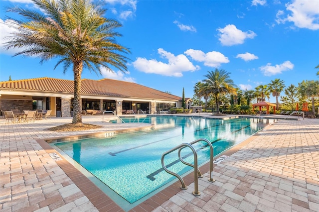 11354 Callisia Dr, Odessa, FL 33556 - community pool featuring a patio area