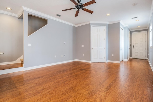 102 S Moody Ave Unit 1, Tampa, FL 33609 - unfurnished living room featuring ceiling fan, wood finished floors, recessed lighting, baseboards, and ornamental molding