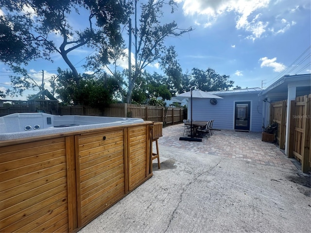 1200 47th St N, Saint Petersburg, FL 33713 - fenced backyard featuring a patio and a hot tub