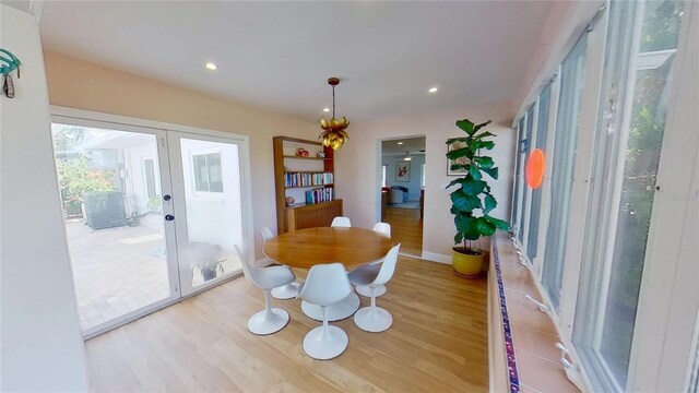 1200 47th St N, Saint Petersburg, FL 33713 - dining room with wood finished floors, french doors, and recessed lighting