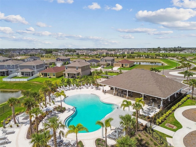 9577 Sandy Bluffs Cir, Parrish, FL 34219 - community pool with a residential view, a patio area, and a water view