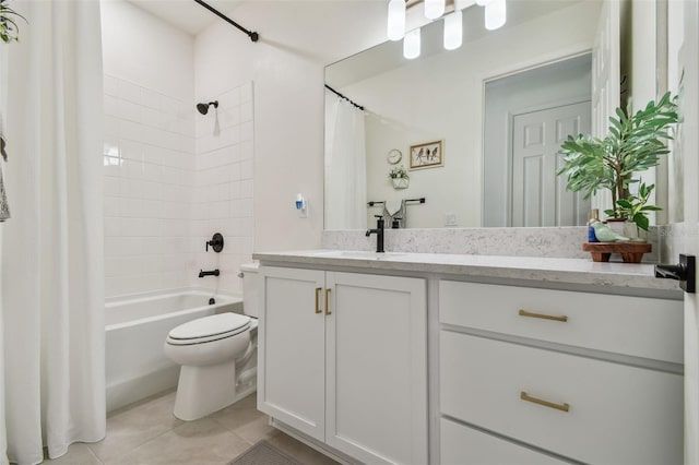9577 Sandy Bluffs Cir, Parrish, FL 34219 - full bathroom with vanity, toilet, shower / tub combo with curtain, and tile patterned flooring