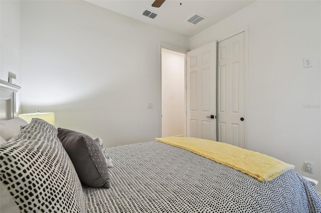 9577 Sandy Bluffs Cir, Parrish, FL 34219 - bedroom featuring ceiling fan and a closet