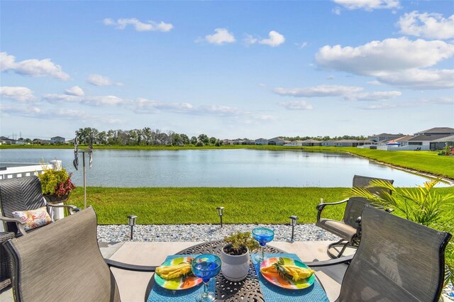 9577 Sandy Bluffs Cir, Parrish, FL 34219 - view of patio / terrace featuring a water view