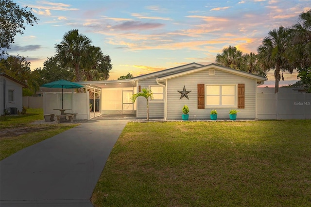 512 Flame Tree Dr, Apollo Beach, FL 33572 - view of front of property with driveway, cooling unit, and a carport