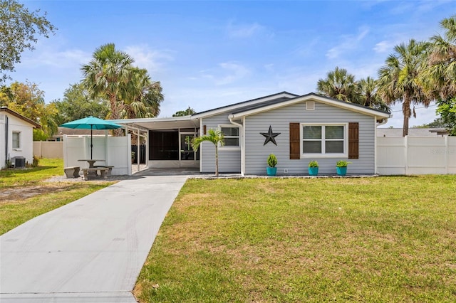 512 Flame Tree Dr, Apollo Beach, FL 33572 - view of front facade with driveway, cooling unit, and an attached carport