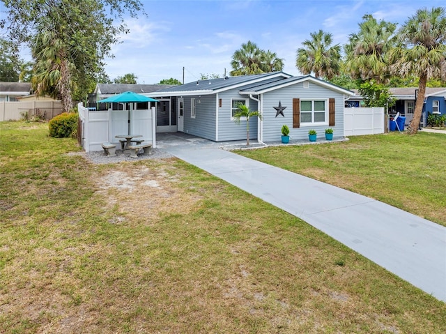 512 Flame Tree Dr, Apollo Beach, FL 33572 - view of front of home with concrete driveway and an attached carport