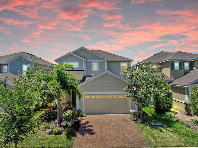 6118 Voyagers Pl, Apollo Beach, FL 33572 - view of front facade with a garage and decorative driveway