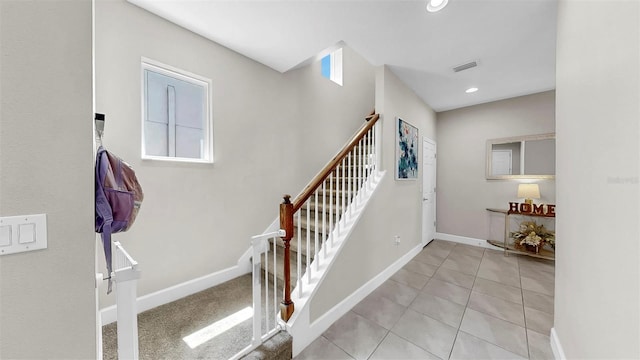 6118 Voyagers Pl, Apollo Beach, FL 33572 - staircase featuring tile patterned floors and recessed lighting