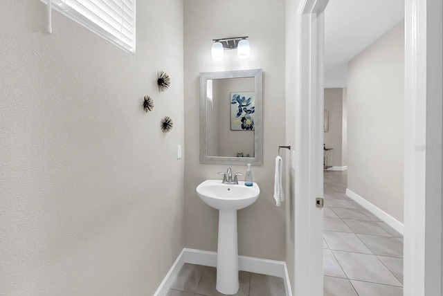 6118 Voyagers Pl, Apollo Beach, FL 33572 - bathroom with tile patterned floors and baseboards