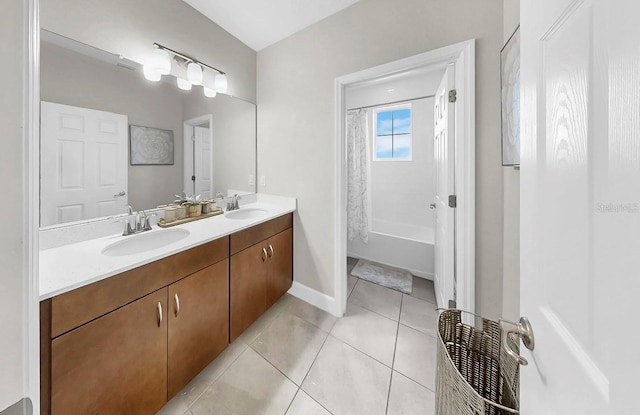 6118 Voyagers Pl, Apollo Beach, FL 33572 - bathroom featuring double vanity, tile patterned flooring, and shower / bath combo with shower curtain